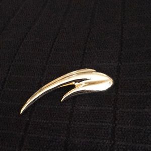 Gold tone lapel pin